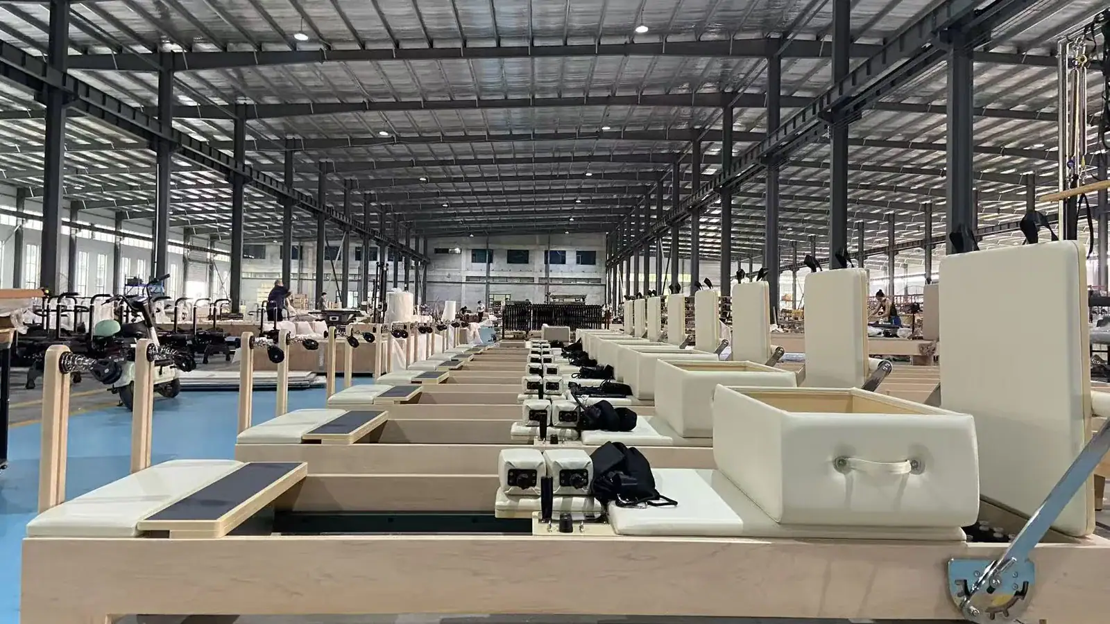 WD-MS-003 wooden Pilates reformers undergoing inspection at the P.E.Pilates factory