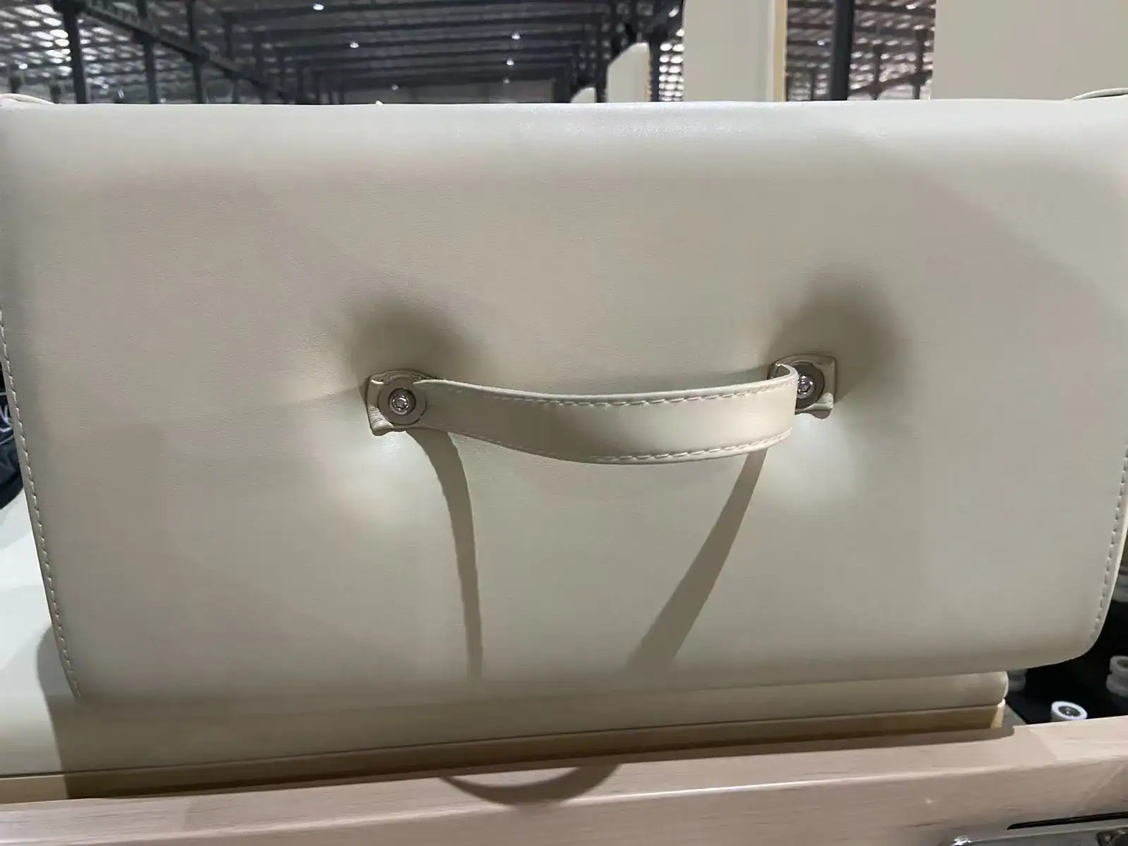 Upholstery strap and attachment detail on a WD-MS-003 Pilates reformer