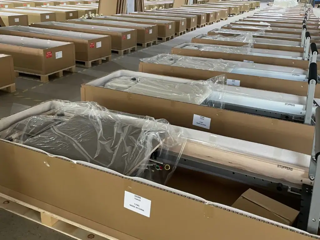 Mixed Pilates equipment order prepared for export loading