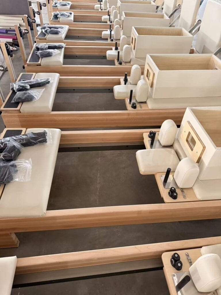 Pilates reformer with tower