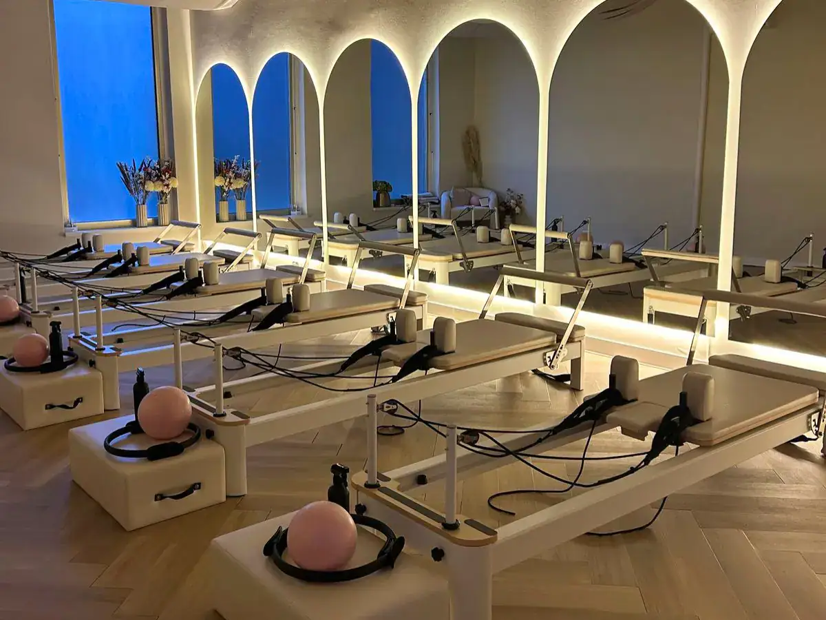 Commercial Pilates reformers prepared for professional studio use