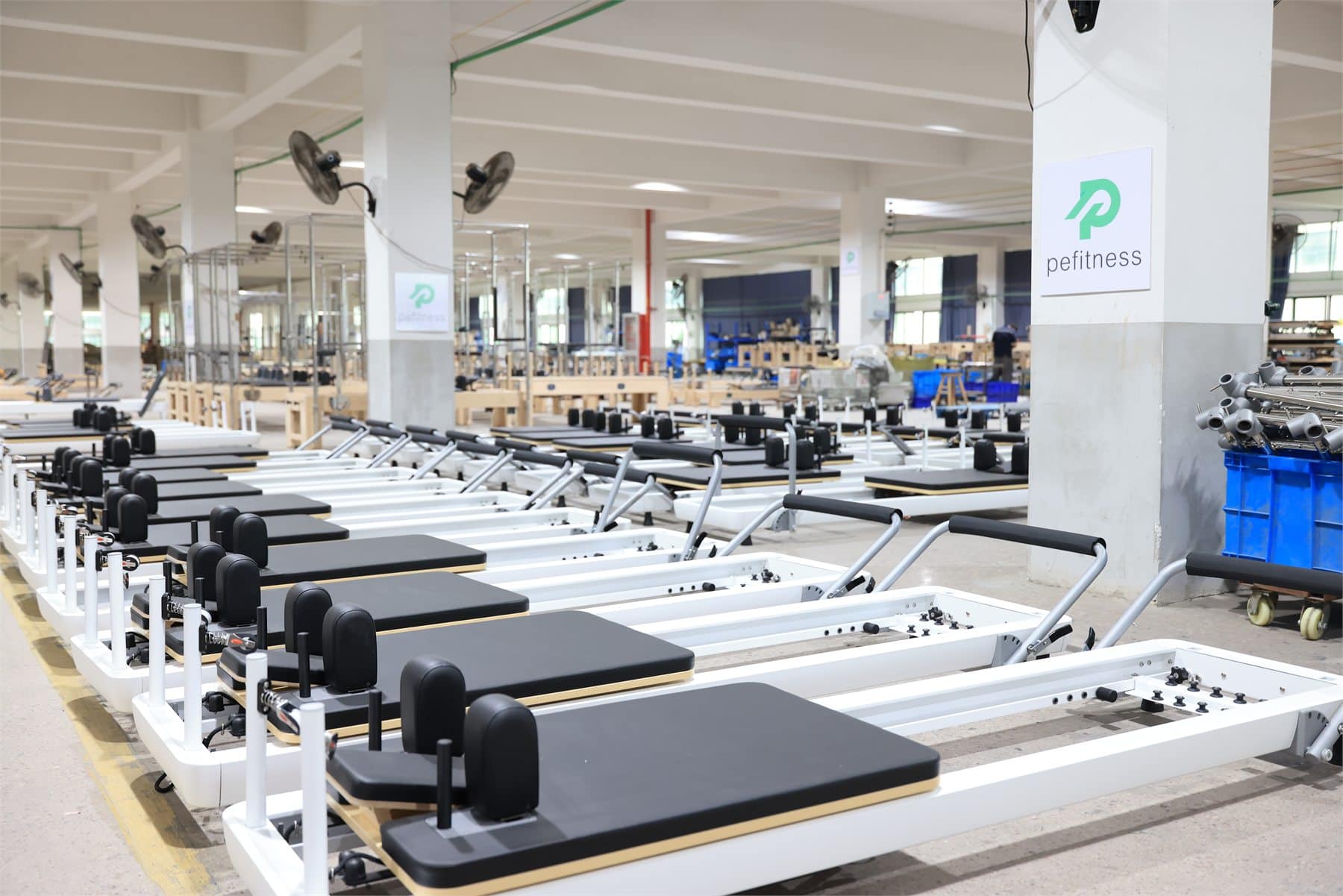 commercial Pilates reformer setup in PE Pilates factory showroom