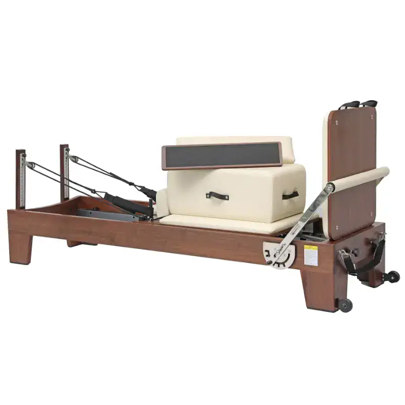 walnut wood Pilates reformer