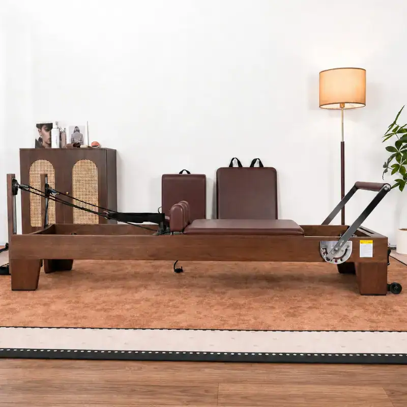 walnut wood Pilates reformer