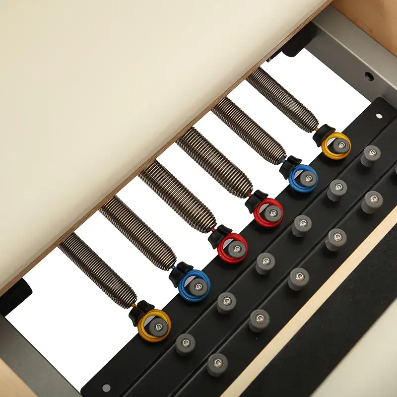 Vertical spring system on a WD-MS PLUS reformer with tower