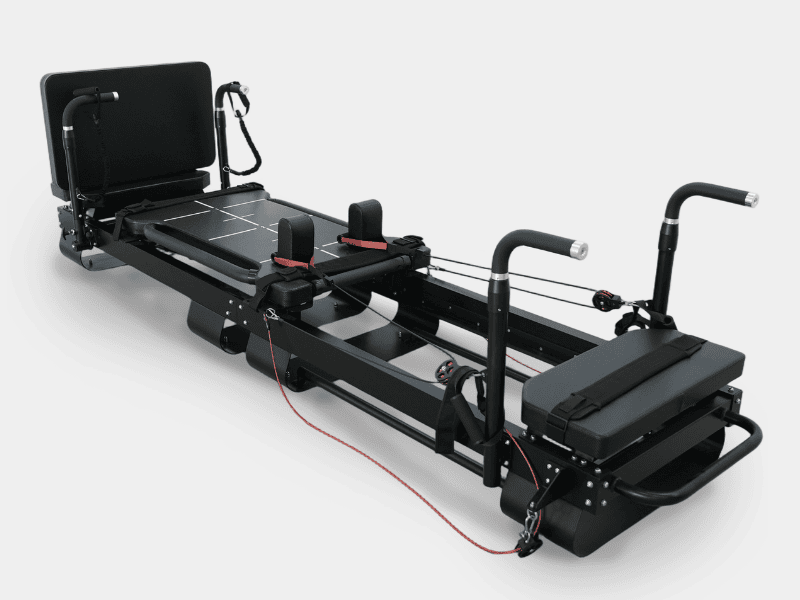 This white aluminum sleek and modern Pilates Reformer features a cushioned carriage, adjustable footbar, and durable resistance cords—perfect for enhancing strength, flexibility, and core stability in any home or studio setting.